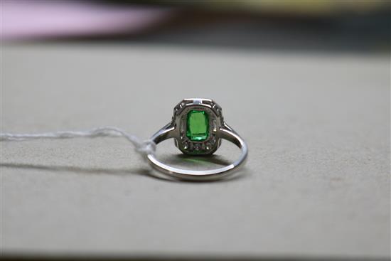 An 18ct white gold, green garnet? and diamond cluster ring, size N.